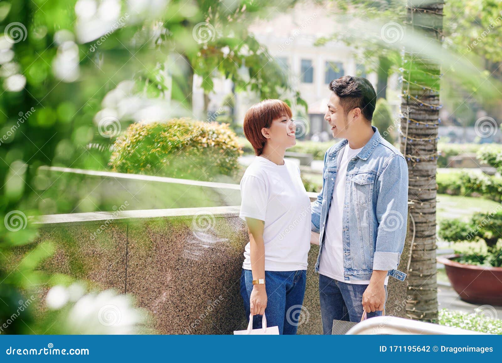 wet Asian outdoor couple